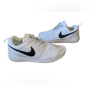 Nike White and Black Sneakers with Minimalist Design